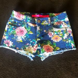 Denim shorts with floral print